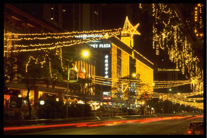 <strong>Photograph of Christmas light-up at Tangs Department Store and Lucky Plaza on Orchard Road</strong><br>
14 December 1986<br>
Ministry of Information and the Arts Collection<br>
Courtesy of National Archives of Singapore